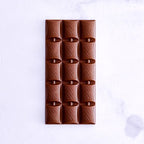 HAZELNUT PRALINE – MILK CHOCOLATE – 100g